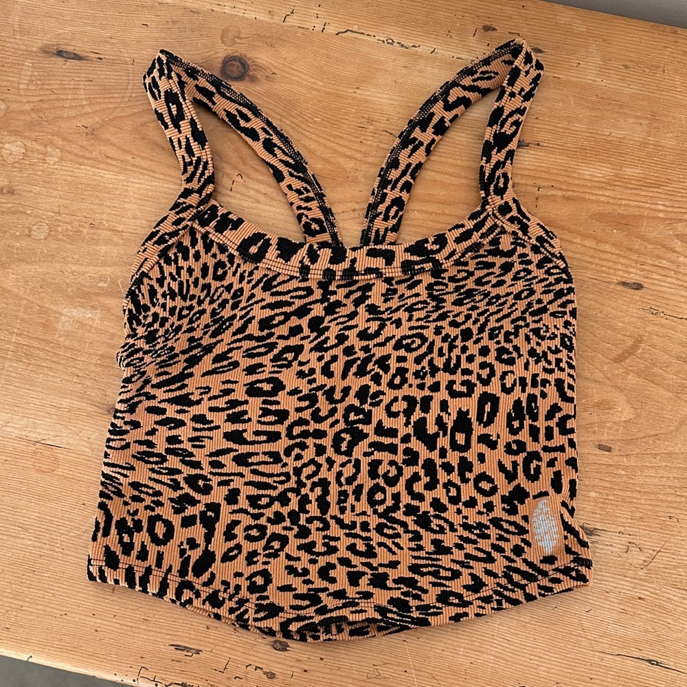 Free people Movement Tank. NWOT. Size XS and is too small for me, never worn.